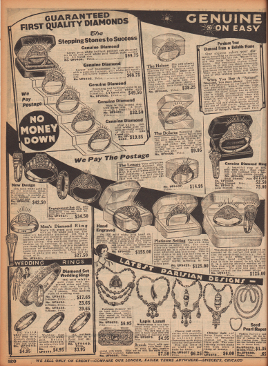 „Echte [Diamanten] – Auf günstigem [Kredit]“ (engl. „Genuine [Diamonds] – On Easy [Credit]“).
Ringe und Hochzeitsringe aus Weißgold mit echten Diamanten für 3,95 bis 155,00 Dollar (1929 weit mehr als ein Monatslohn eines Angestellten). Die Ringe konnten auf Wunsch auch graviert werden.
Unten wird zudem Pariser Modeschmuck (Halsketten mit Karneolen, Lapislazuli oder chinesischer Jade) und eine Metallbrosche mit Perlen angeboten.